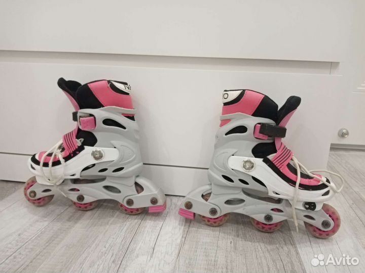 Роликовые коньки