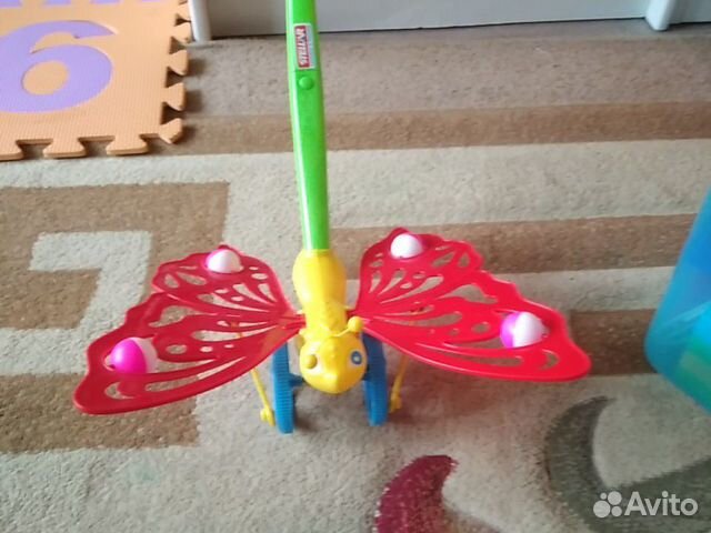 Игрушка каталка бабочка