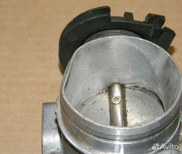 Заслонка дроссельная WV Golf 4 06A133064H