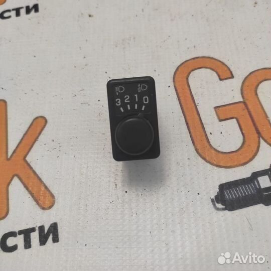 Кнопка корректора фар Nissan