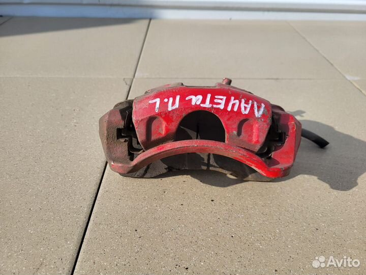 Тормозной суппорт передний левый Chevrolet Лачетти