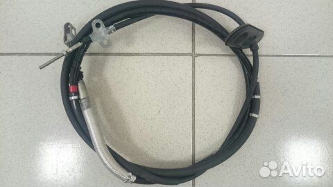 Трос ручного тормоза