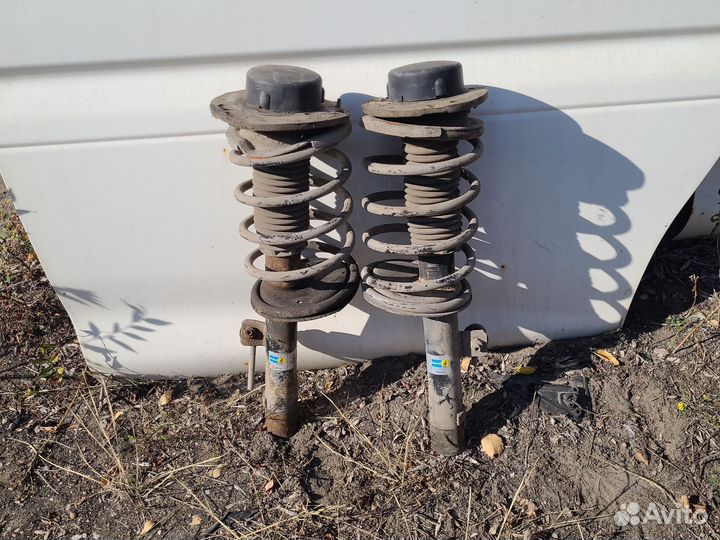 Стойки передние Peugeot 206