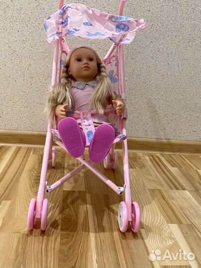 Игрушечная коляска для кукол