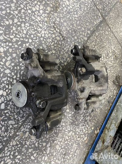 Суппорт задний camry 70