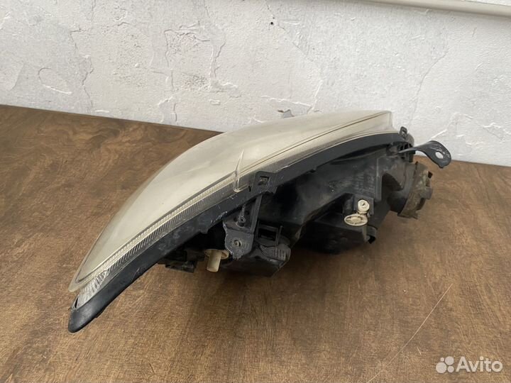 Фара левая Toyota Corolla 120