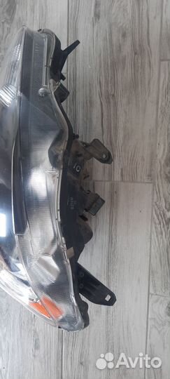 Фара передняя левая lancer 10