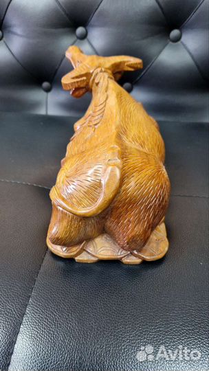 Бык из цельного куска дерева. Денежный