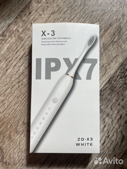 Электронная зубная щетка