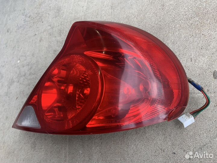 Фонарь задний правый Kia Spectra USA