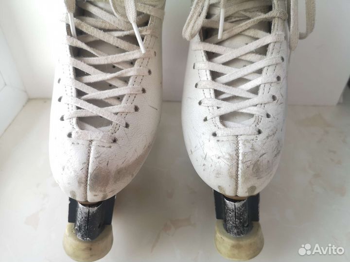 Роликовые коньки