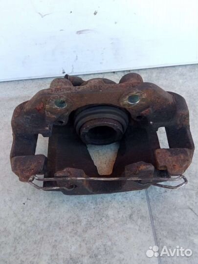 Суппорт тормозной передний левый Opel Vectra B