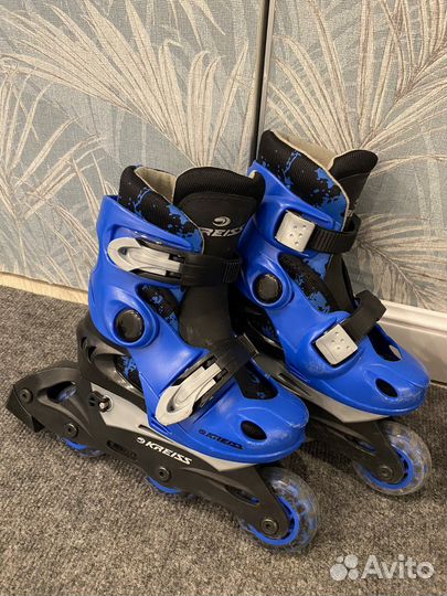 Роликовые коньки