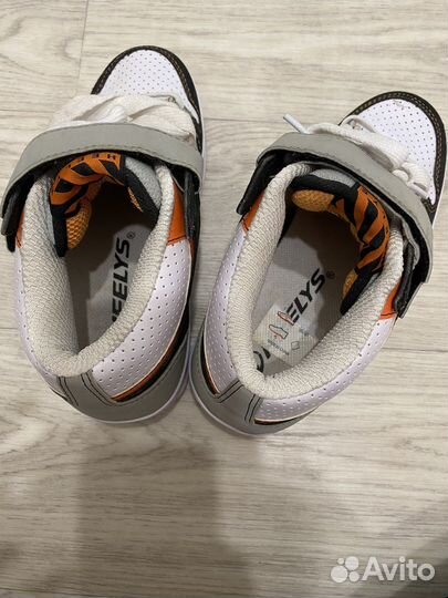 Роликовые кроссовки heelys