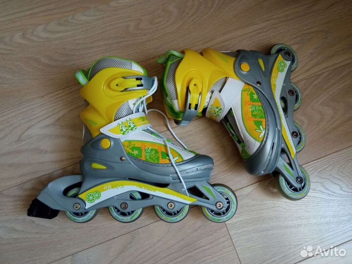 Роликовые коньки женские раздвижные с защитой