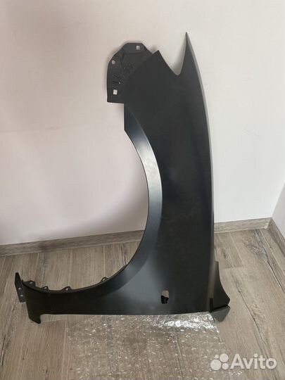 Новое крыло для Мазда-3 вк