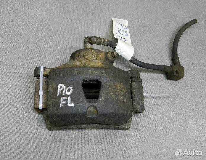 Суппорт передний левый Nissan Primera P10