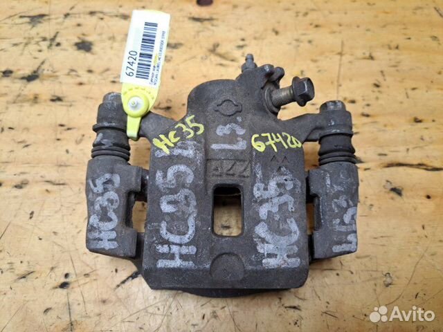 Суппорт задний левый Nissan Laurel HC35 RB20DE