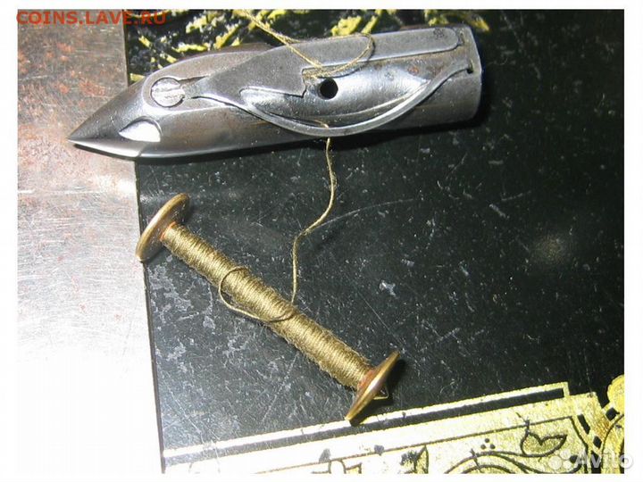 Антикварная ножная швейная машинка Singer