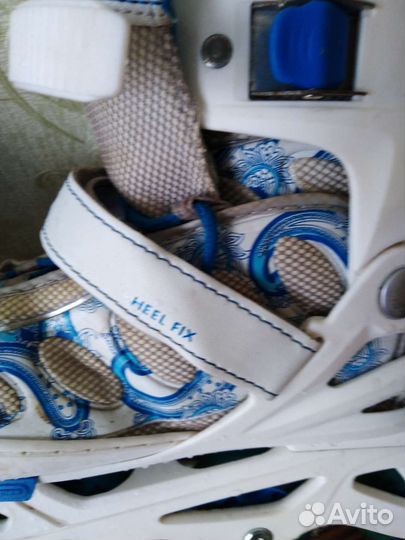 Роликовые коньки