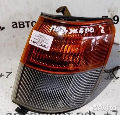 Указатель поворота левый желтый Mitsubishi Pajero