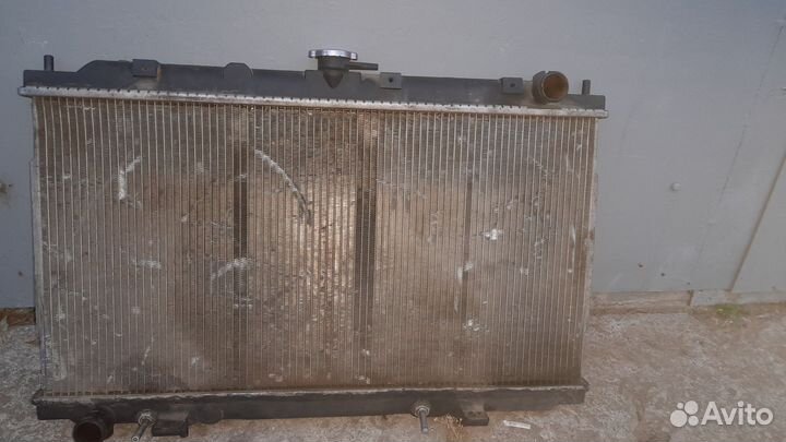 Радиатор ниссан р12 2литра
