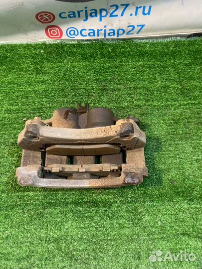 Суппорт тормозной (9) передний левый Nissan