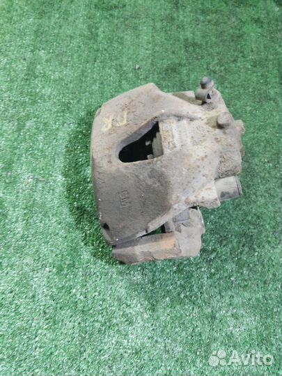 Суппорт тормозной передний правый Opel Astra H