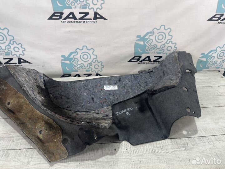 Обшивка багажника правая Renault Sandero Stepway