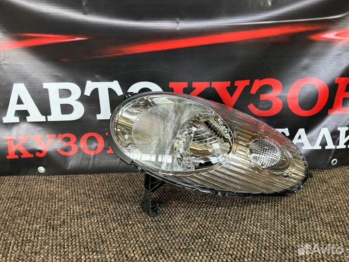Фара левая Nissan Micra K-12 2002-2007