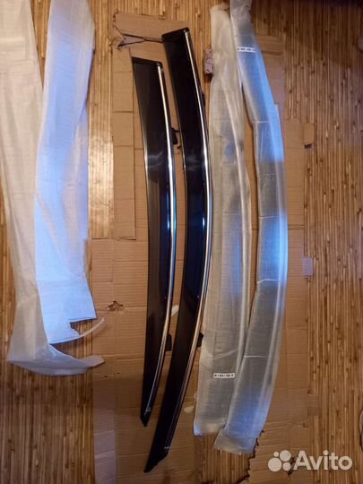 Ветровики на Mazda-Axelа