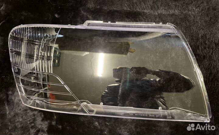 Стекло фары Паджеро 3