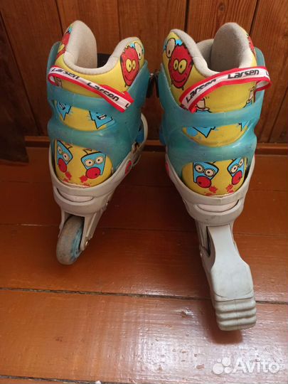 Роликовые коньки