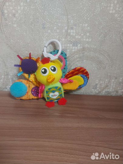 Игрушка погремушка