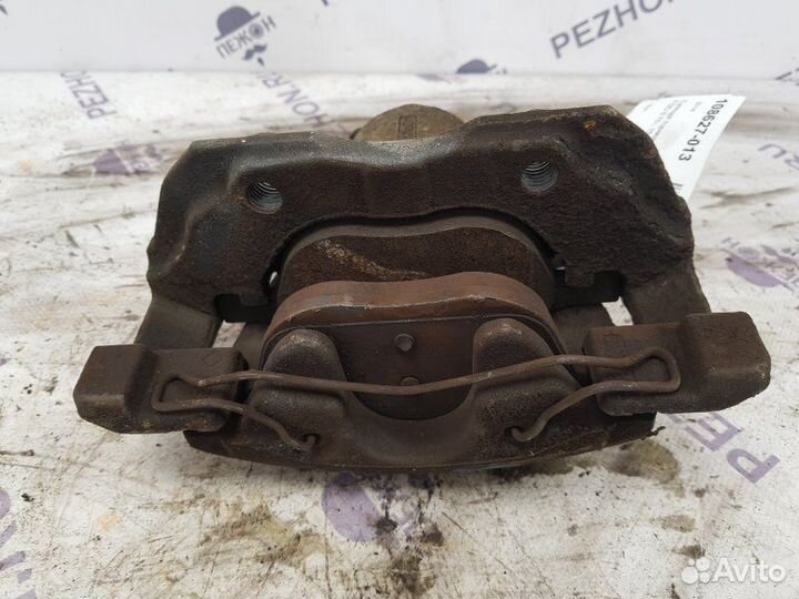 Суппорт тормозной передний левый Ford Focus