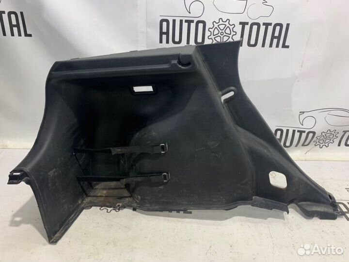 Обшивка багажника задняя левая Hyundai Solaris