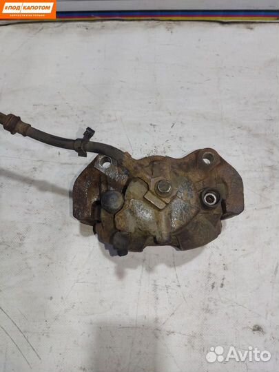 Суппорт тормозной передний правый Opel Astra