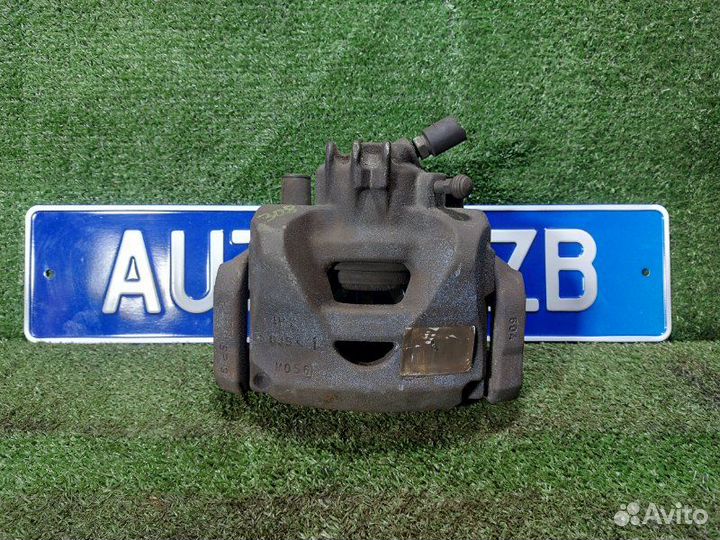 Суппорт тормозной передний левый Peugeot 308 Sw