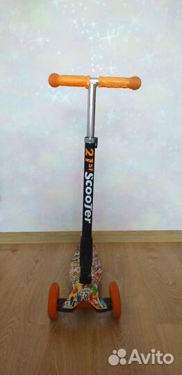 Трёхколёсный самокат