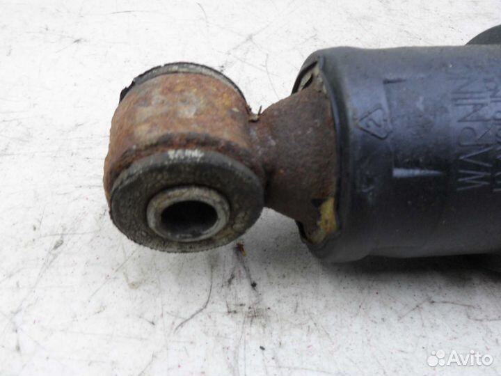 Амортизатор задний L Hummer H2 H2 2005 - 2009