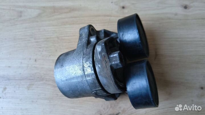 Натяжитель ремня генератора BMW 3 11 28 7 810 807