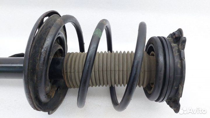 Амортизатор подвески передний правый Nissan Teana