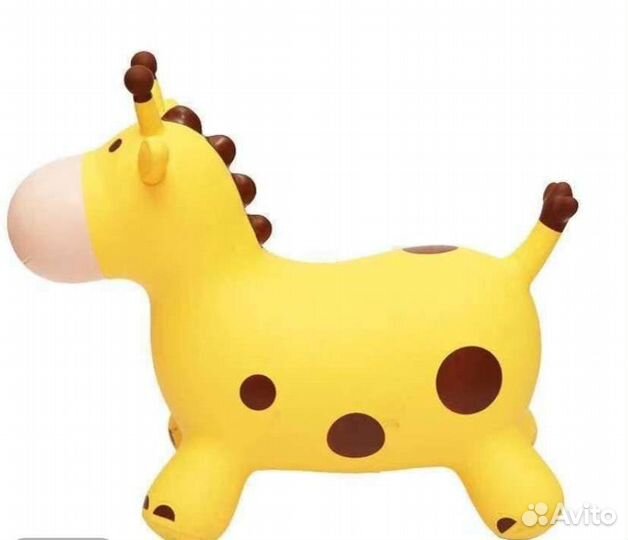 Игрушка прыгалка музыкальная Корова Жираф