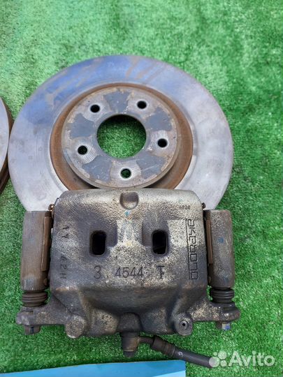 Передние тормоза nissan X-trail T32 Двухпоршневые