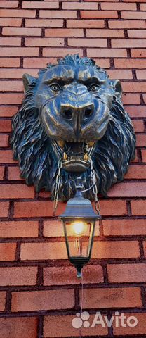 Барельеф голова льва