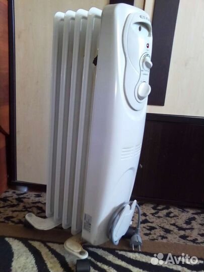 Масляный обогреватель