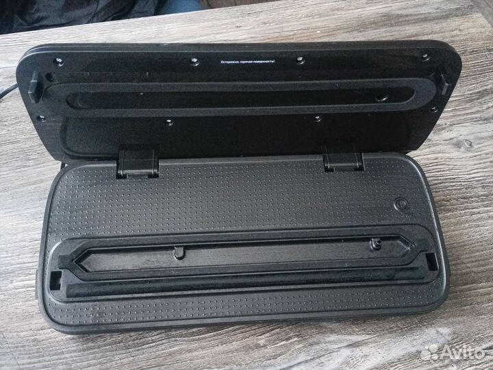 Вакуумный упаковщик