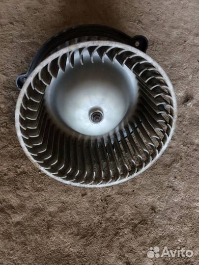 Моторчик печки Kia Carens 1