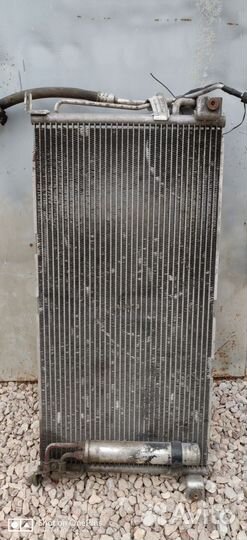 Радиатор кондиционера Mitsubishi Lancer 9