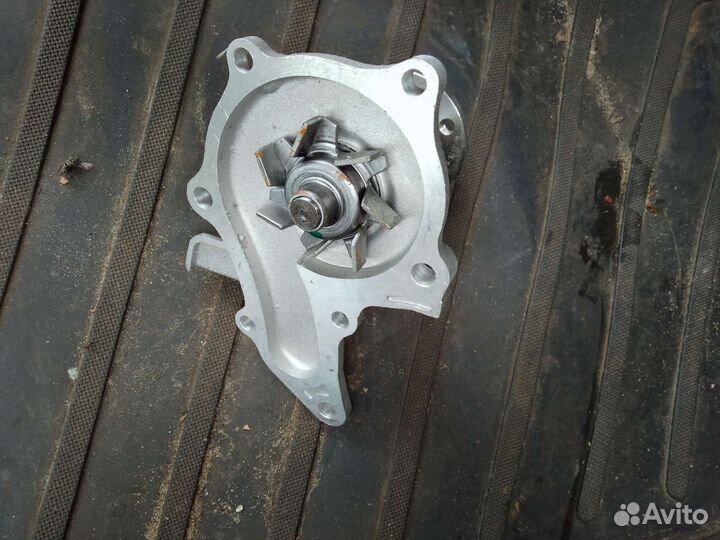 Водяная помпа toyota Карина е